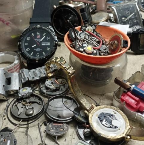 Reparasi Jam & Kalkulator